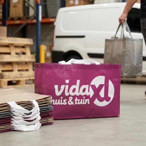 Woven polypropylene reusable bags stacked and ready for repeated retail and transport use