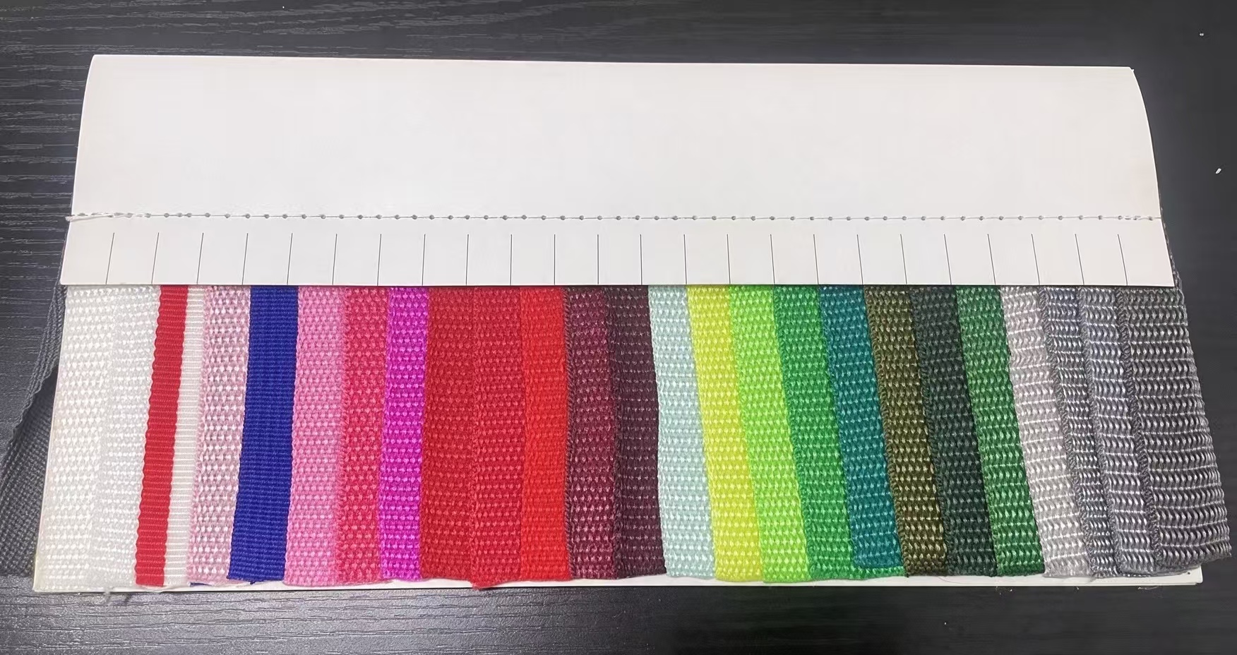 PP handle webbing color card with white, pink, red, green and gray samples.